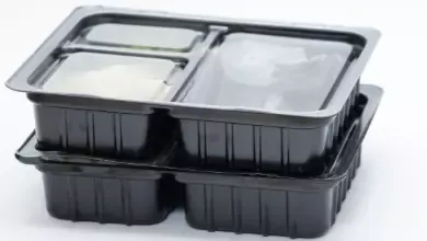 two black plastic food containers